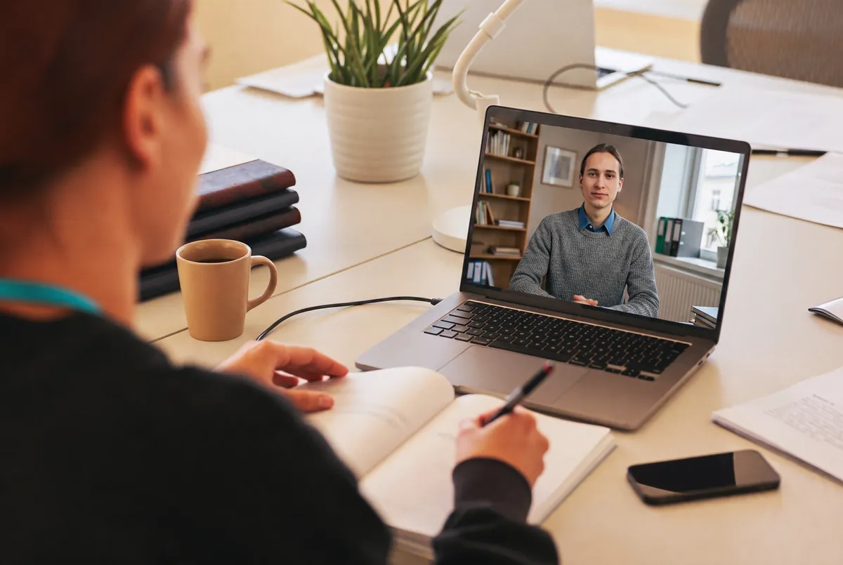 A laptop showing a Eupry training video ready to play